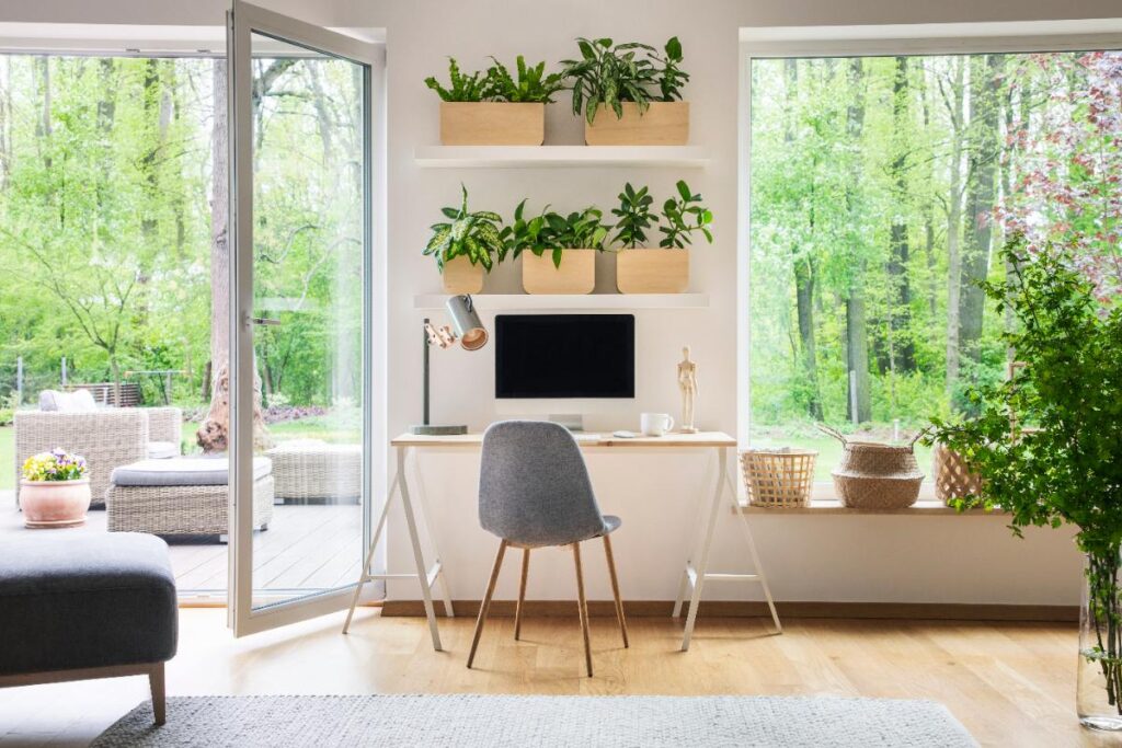 Des meubles de bureau avec des plantes vertes